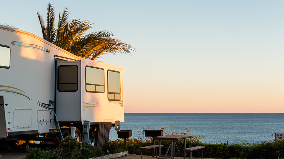 Camper posted up by the beach